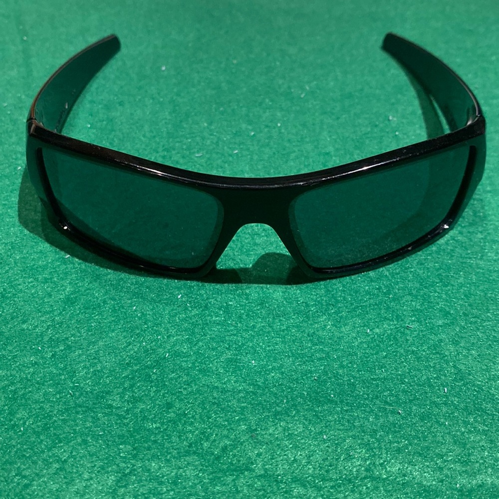 Oakley Gascan style sunglasses.